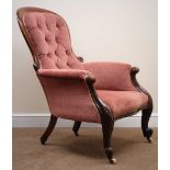 Victorian mahogany framed salon armchair, upholstered in a deep buttoned salmon fabric,