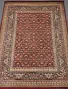 Pair Persian style maroon ground rug, repeating border,