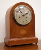 Edwardian arched top inlaid mahogany mantel clock with silvered Arabic dial,