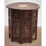 Carved Eastern hardwood folding table, D53cm,