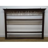 Country made oak and pine three tier plate rack with shaped frieze, W158cm, H115cm,