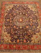 Mahal red and blue ground rug, central medallion with floral field, repeating border,