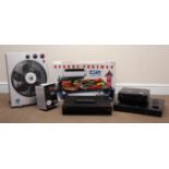 George Foreman G2 Combo Grill Compact, a Benq MS510 digital projector, two blue ray DVD players,