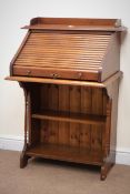 Early 20th century oak tambour desk, raised back, moulded top, fitted interior,