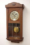 20th century oak wall clock with silvered Arabic dial and bevelled panel glazed door,