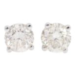 Pair of 18ct white gold diamond stud earrings, hallmarked, diamond total weight 1.