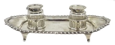 Silver inkstand of shaped rectangular form, gadroon border,