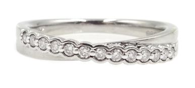 9ct white gold half eternity cross-over ring,