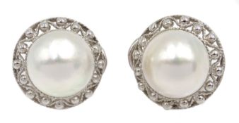 Pair of 9ct white gold mabe stud earrings, hallmarked Condition Report Approx 7.