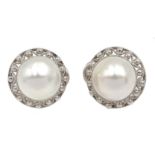 Pair of 9ct white gold mabe stud earrings, hallmarked Condition Report Approx 7.