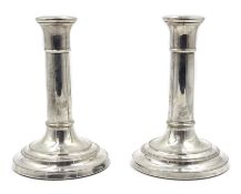 Pair of Georgian style silver candlesticks by John Bull Ltd New Bond Street London 1996 weighted 14.