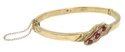 9ct gold garnet and diamond bangle, stamped 375,