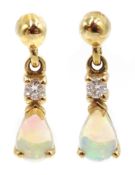 Pair of 9ct gold diamond and opal pendant earrings,