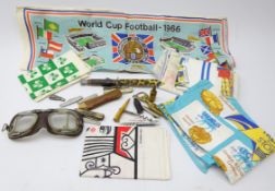 1966 World Cup tea towel and other souvenir tea towels, pair of early flying or motoring goggles,