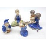 Four Royal Copenhagen figures: Girl with Symbols 3677, Boy on Marrow 4539,