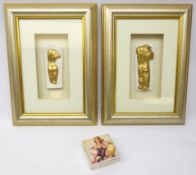 Pair of plaster torso casts impressed DH, mounted in silvered gilt frames,