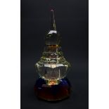 Art Deco style prism glass scent bottle of rounded stepped form,