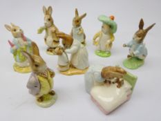 Eight Royal Albert Beatrix Potter figures including Benjamin Bunny, Peter in Bed,