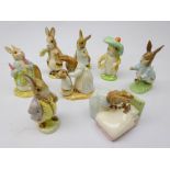 Eight Royal Albert Beatrix Potter figures including Benjamin Bunny, Peter in Bed,