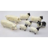 Two Beswick Rams, three lambs, Sheepdog,