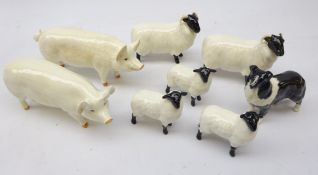 Two Beswick Rams, three lambs, Sheepdog,