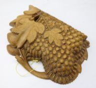 Black Forest style wooden jewellery box carved with fruiting vines in the form of a ladies handbag,