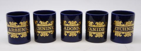 Set of five 1960s Hornsea 'Poison' mugs gilt labels for Arsenic, Cyanide, two Strychnine,