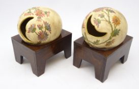 Pair of Victorian pottery egg shaped Spoon warmers, decorated with flowers,