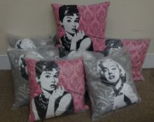 Four Marilyn Monroe printed cushions and four printed with Audrey Hepburn,