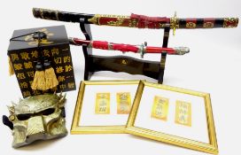 Japanese Katana type swords on display stand,
