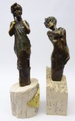 Two French bronzed semi-nude ladies mounted on faux marble bases,