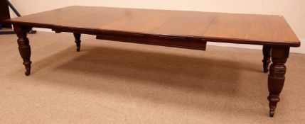 Large Edwardian walnut extending dining table, three leaves, moulded top,