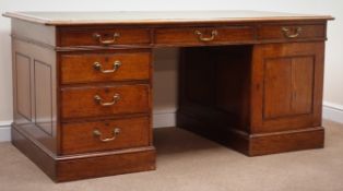 Edwardian oak twin pedestal desk, inset green leather top, moulded edges,