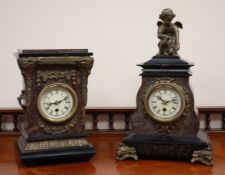Victorian style black slate and simulated marble mantle clock with gilt metal Cupid figure and
