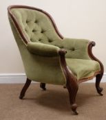 Victorian mahogany framed nursing chair, upholstered in a deep buttoned green fabric, cabriole legs,