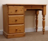 Pine single pedestal desk, moulded top, three drawers, turned supports, W111cm, H83cm,