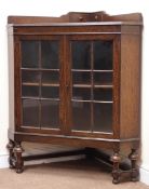 Early 20th century oak corner display cabinet,