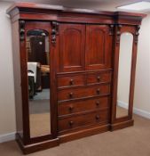 Victorian mahogany triple wardrobe, moulded projecting cornice,