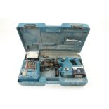 A MAKITA BHR 200 hammer drill and other tools (not tested)