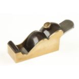 A steel soled brass chariot plane 4 1/2" x 1 3/4" with brass holding screw through ebony lever G+