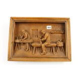 A reproduction framed resin display of two carpenters at the bench signed C.A.