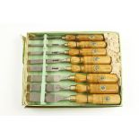 A set of 8 firmer chisels by ROBINSON HALL Sheffield with orig decal on ash handles in orig box F