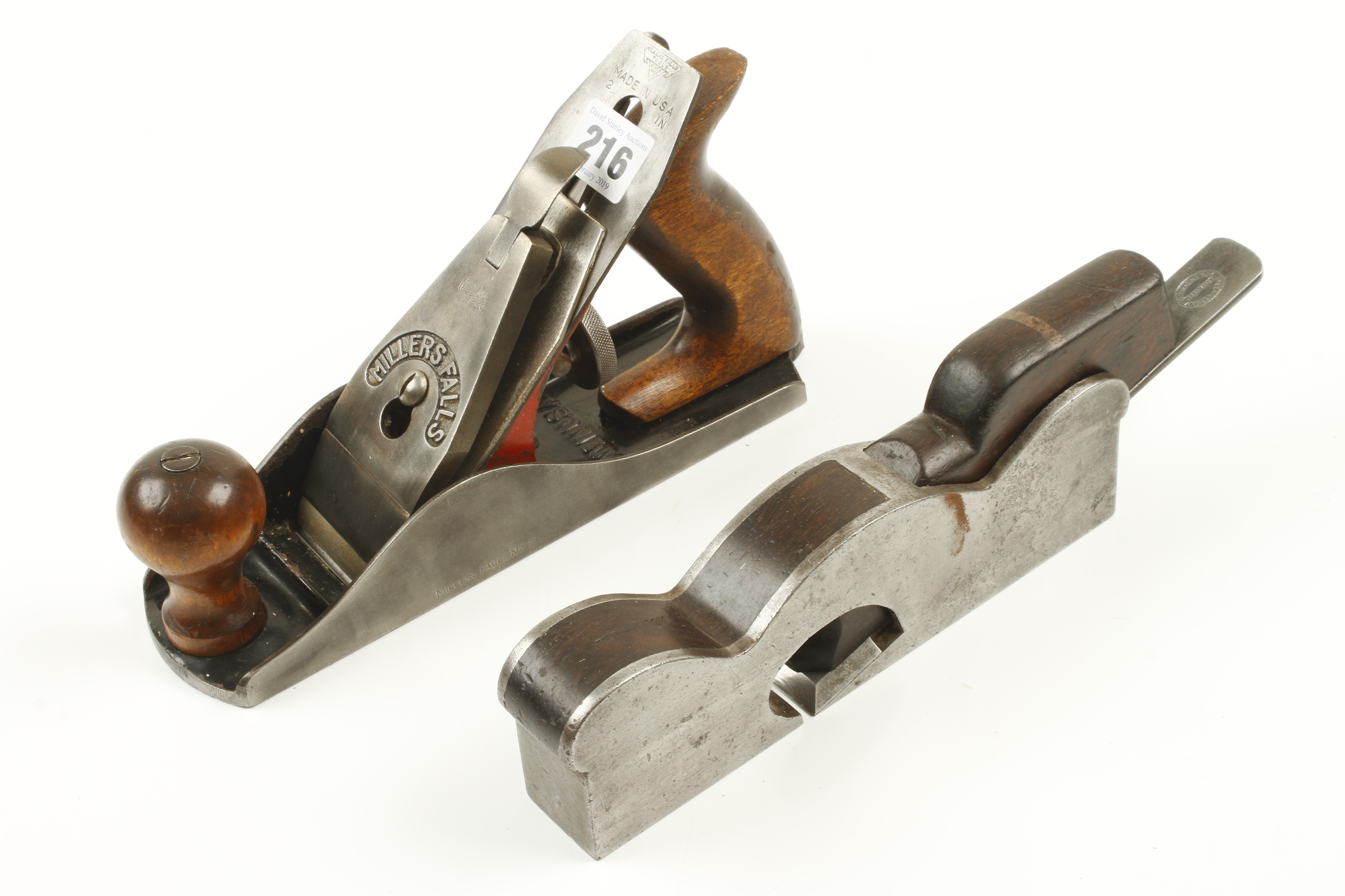 A MILLERS FALLS No 9 smoother (G++) and an iron shoulder plane with wide mouth (G-)