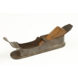A 16/17c European mitre plane 9" x 2 1/2" with shapely protruding front tote and chamfered sides