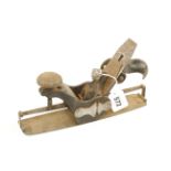 A USA STANLEY No 113 circular plane with side wheel adjuster.