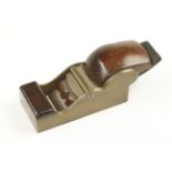 A quality steel soled gunmetal chariot plane 4" x 1 7/8" with rosewood infill and cupids bow wedge
