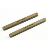 Two 10 3/4" brass topped ebony levels by J.