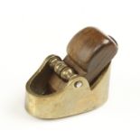An early violinmaker's brass plane with round both ways sole 2 1/4" x 1 1/4" with decorative brass