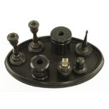 A 6 piece ebony dressing table set,