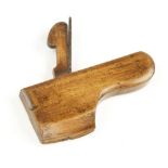A small beech tailed compassed hollow plane by GRIFFITHS with 1 3/4" sole G+